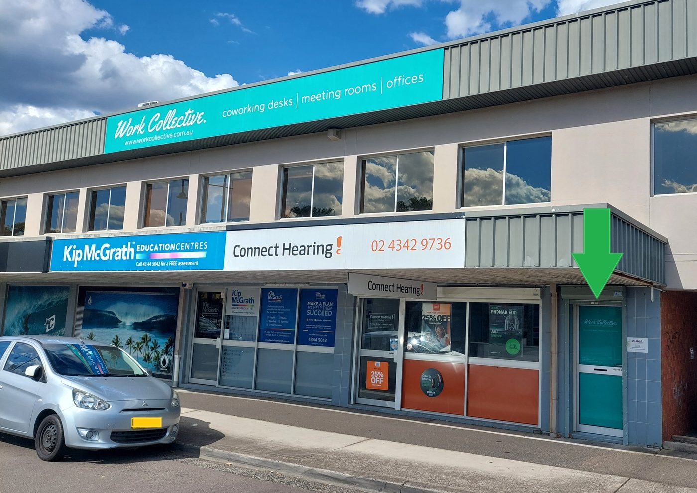 Work Collective, West Street, Umina Beach. The entrance is the teal door under the green arrow, to the right of Connect Hearing.